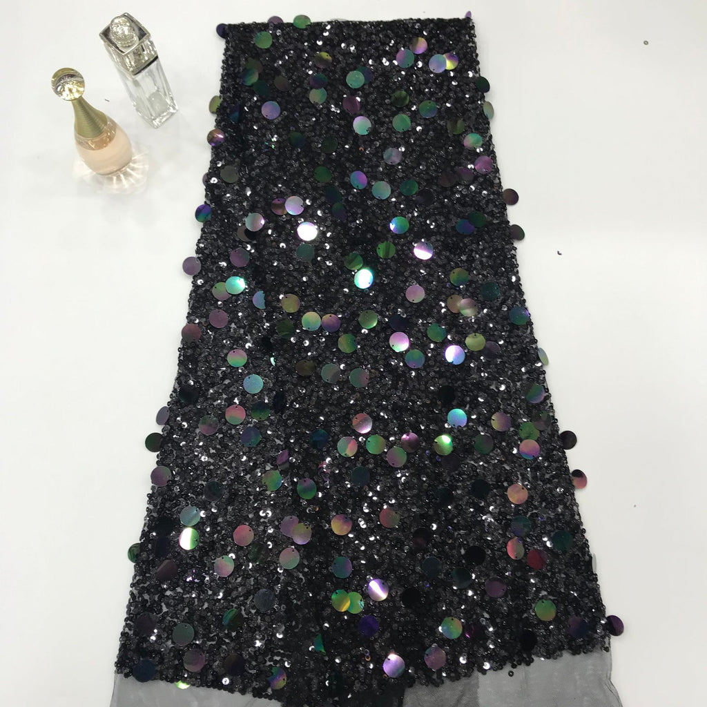 Black sheer embroidered mesh covered with iridescent round sequins