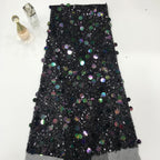 Black sheer embroidered mesh covered with iridescent round sequins