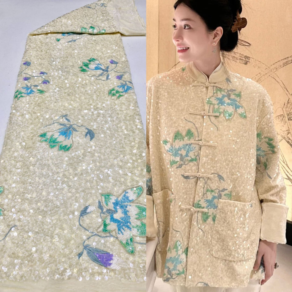 Sparkling beige embroidered fabric shown beside a garment model wearing floral eveningwear