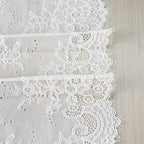 Wide white rose floral stretch lace trim with eyelash edging and embroidered borders