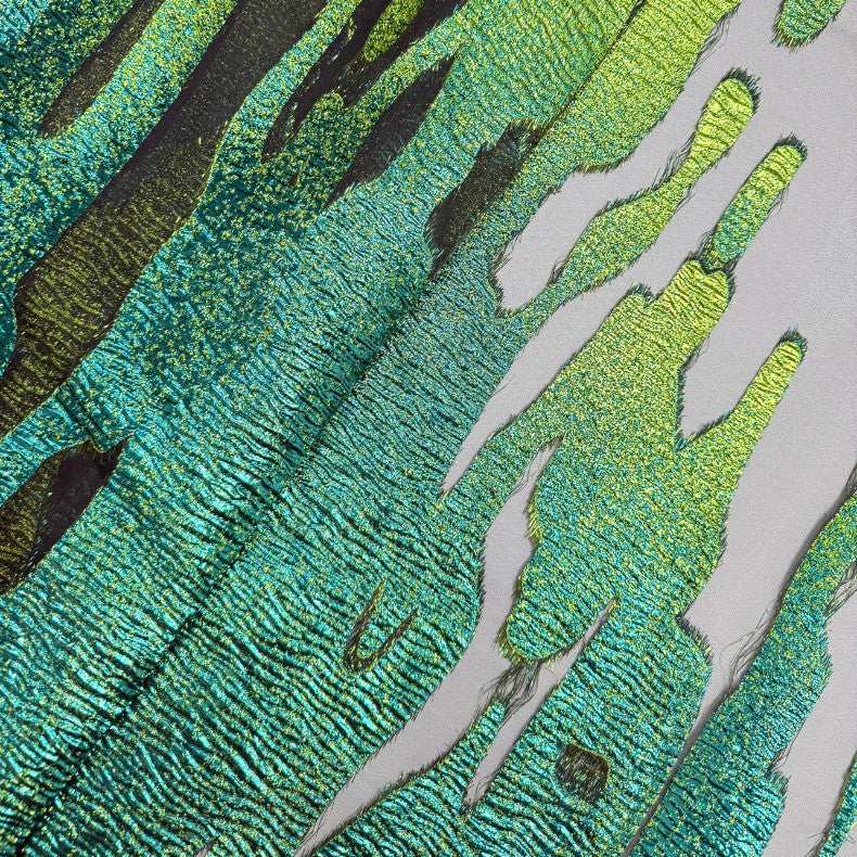 Teal and gold embossed brocade jacquard fabric with bold abstract metallic pattern