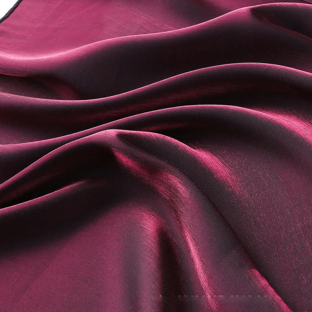 قماش حرير ساتان سائل نابض بالحياة - خامة لامعة لفساتين السهرة