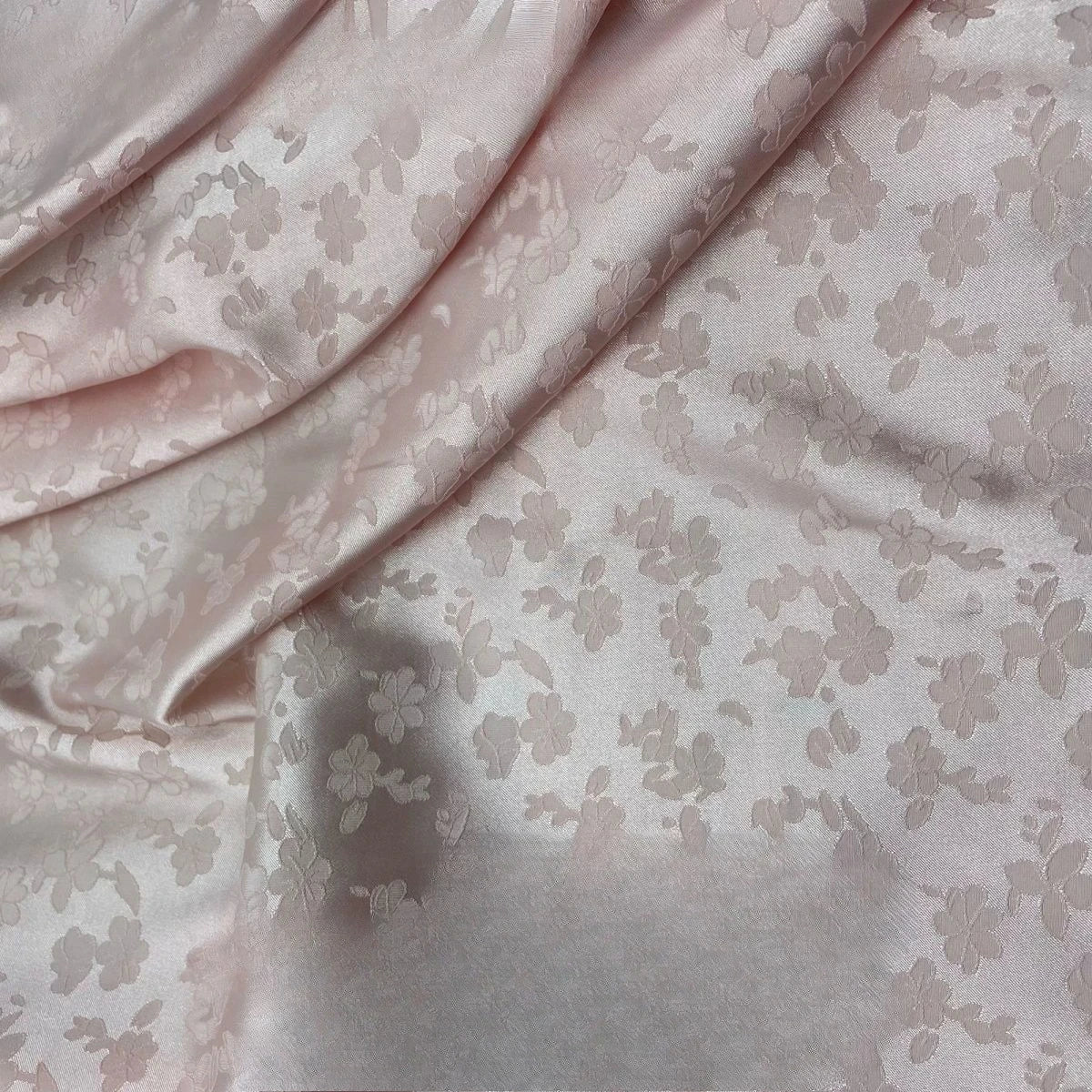 La tela jacquard de seda helada mate de la flor de estrella fugaz se puede utilizar para vestidos de novia, vestidos formales, telas DIY hechas a mano.