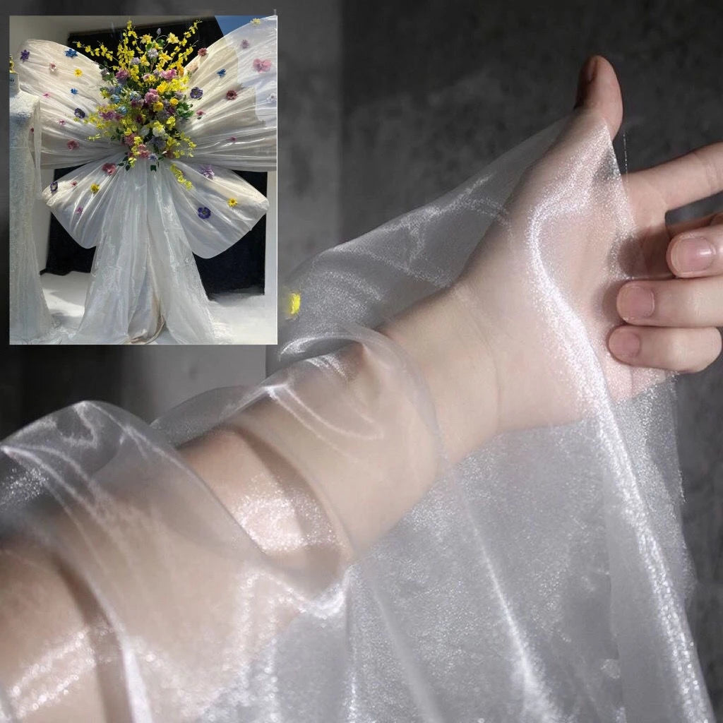 Transparent metallic organza fabric suitable for weddings formal gowns party decorations and bow decorations