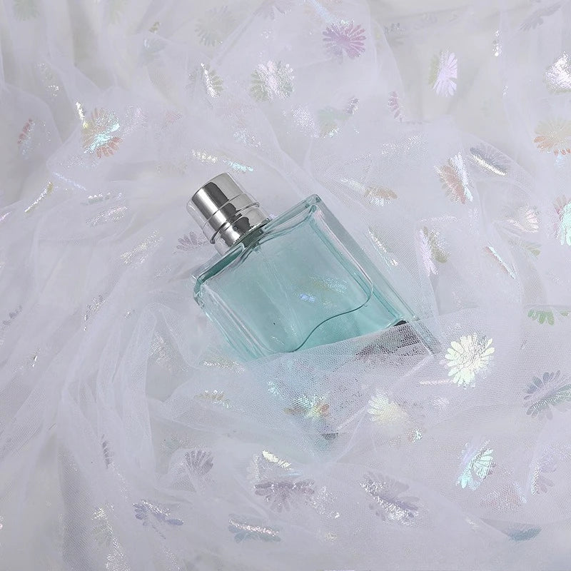 The Iridescent Little Daisy Fabric Is Made Of Soft Netting And Is Suitable For Children's Clothing Dresses And Headwear