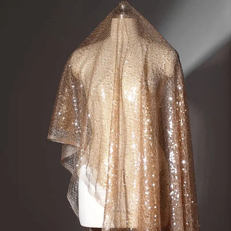 Fish-scale style sequin tulle fabric in vintage champagne gold