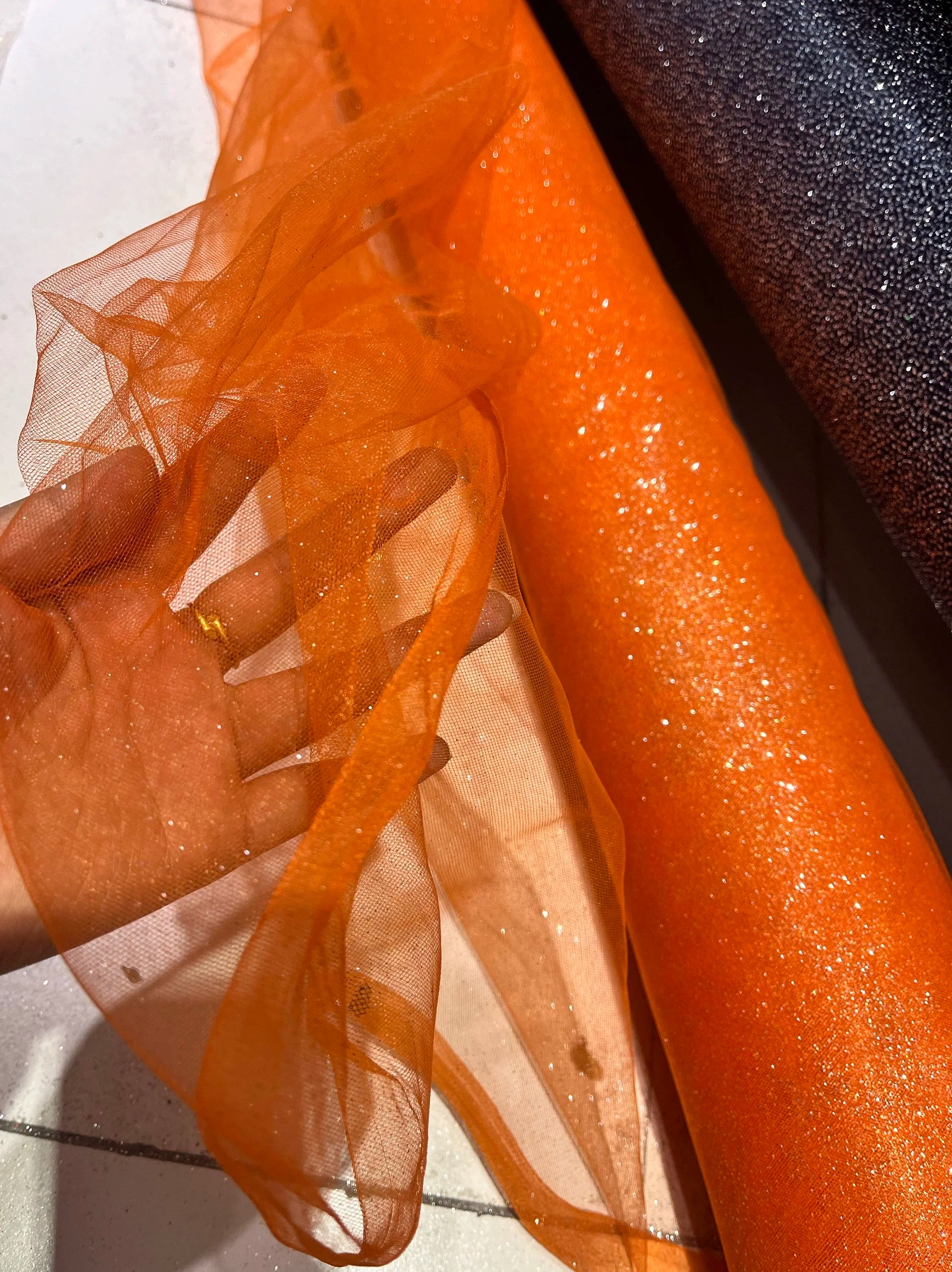 White fine sparkling silver powder with a hard and shiny transparent mesh background for wedding dress fabric decoration