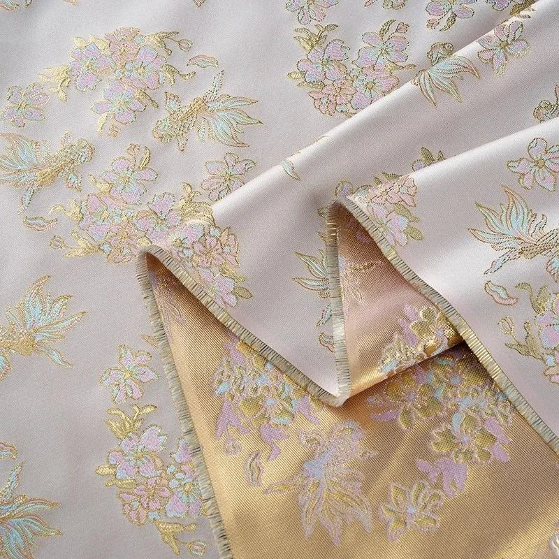 قماش جاكار حريري مطلي بالذهب الوردي الفاتح - نقشة زهرة سمكة ذهبية