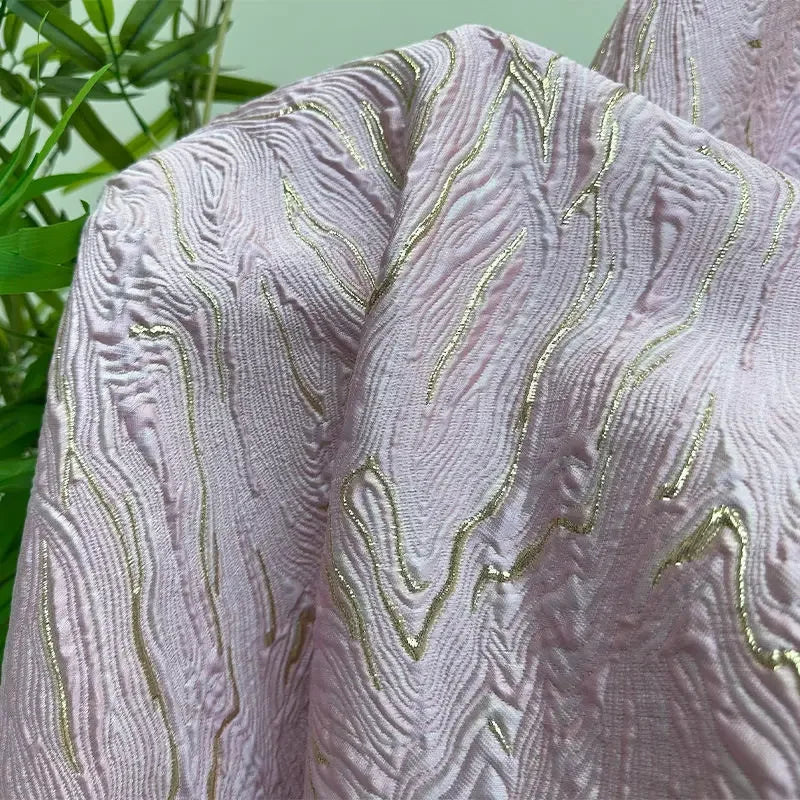 قماش التنورة والفساتين ذو الملمس المطلي بالذهب، سميك ومتدفق، انعكاس خفيف للضوء، نمط جاكار ثلاثي الأبعاد