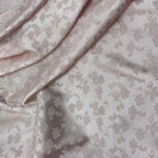 La tela jacquard de seda helada mate de la flor de estrella fugaz se puede utilizar para vestidos de novia, vestidos formales, telas DIY hechas a mano.