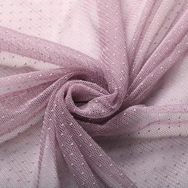 Tela de organza de malla con lunares: material transparente refinado