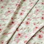 Vestido cheongsam de algodón con estampado floral degradado verde polvo para primavera/verano, tejido suave y ligero que ilumina la piel.