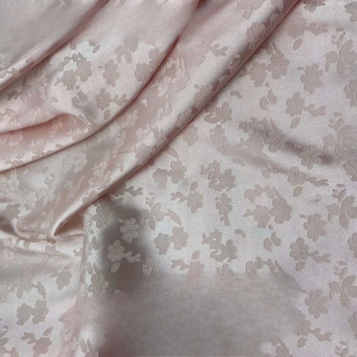 La tela jacquard de seda helada mate de la flor de estrella fugaz se puede utilizar para vestidos de novia, vestidos formales, telas DIY hechas a mano.