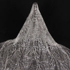 Gold-embossed sequin net fabric suitable for use in wedding dresses formal gowns and for decoration in wedding settings