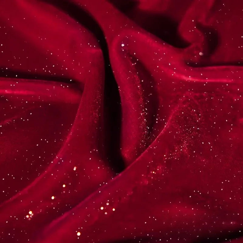 قماش مخملي لامع مرصع بالنجوم بلون أحمر غامق - مادة لامعة 140 سم