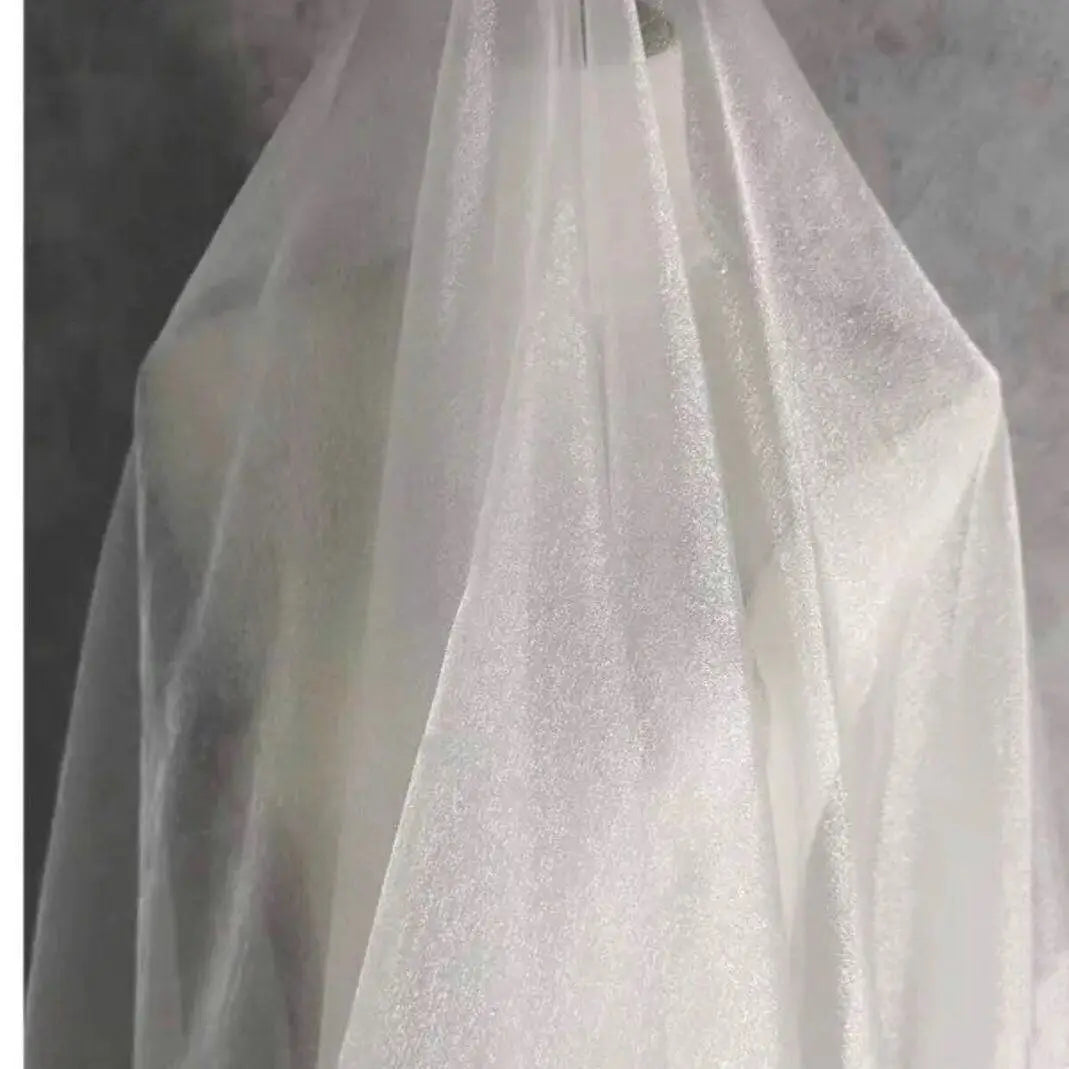 قماش لامع من السحاب والضباب مناسب لفساتين الزفاف والفساتين الرسمية التي تعرض إبداع المصمم