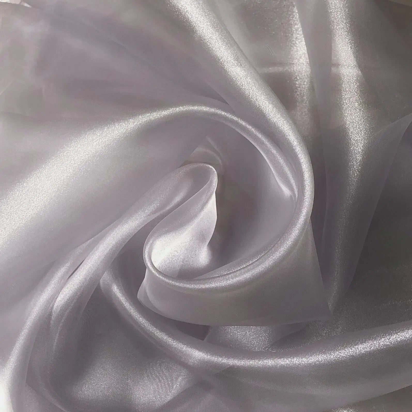 Transparent metallic organza fabric suitable for weddings formal gowns party decorations and bow decorations