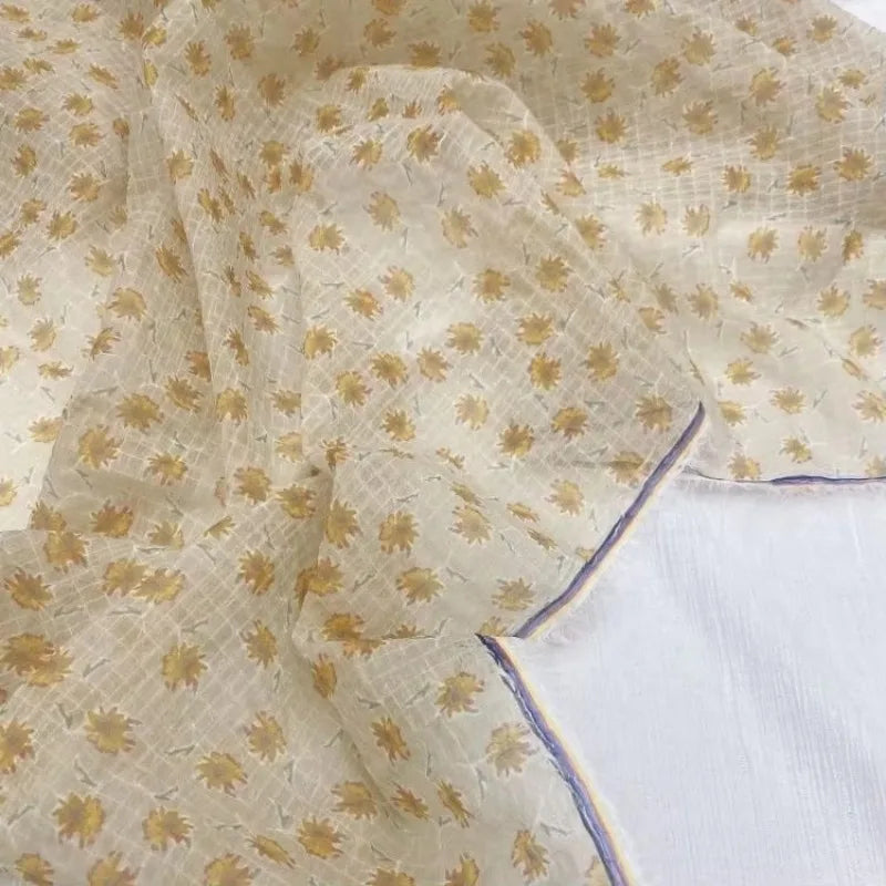 قماش شيفون بفقاعات بلون المشمش - خامة بنمط مربعات صغيرة من ديزي