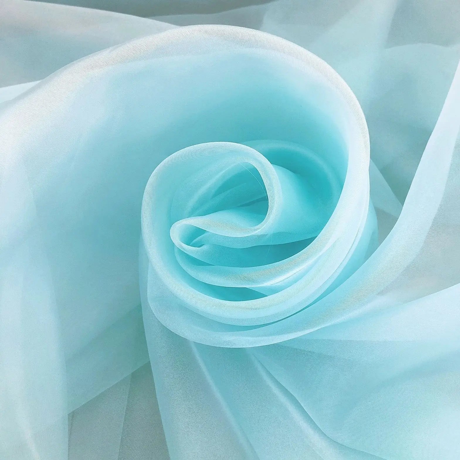 Transparent metallic organza fabric suitable for weddings formal gowns party decorations and bow decorations