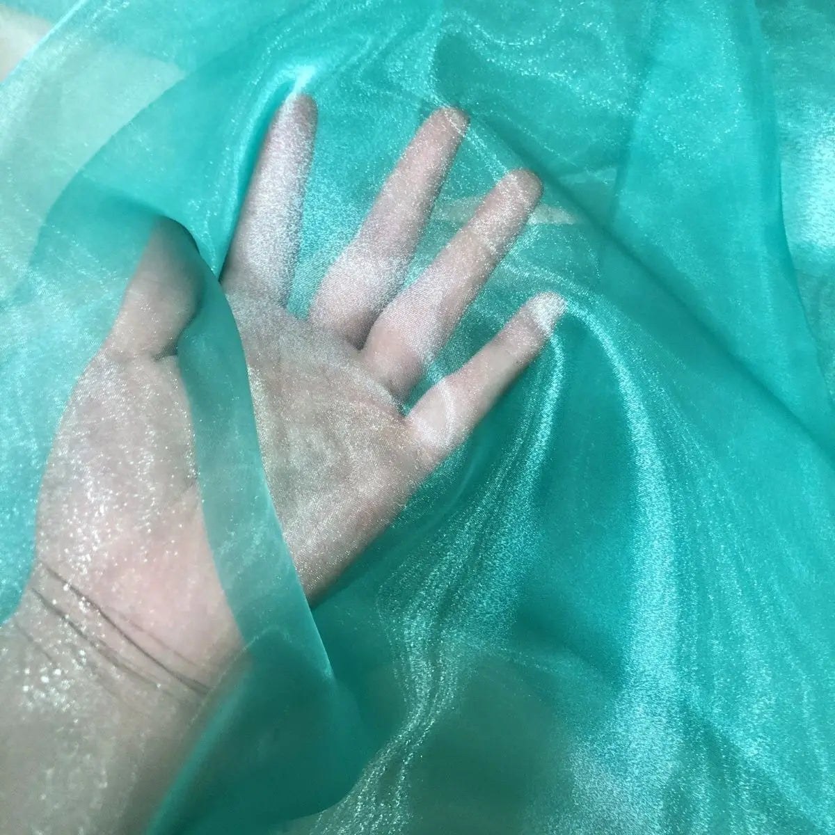 Transparent metallic organza fabric suitable for weddings formal gowns party decorations and bow decorations