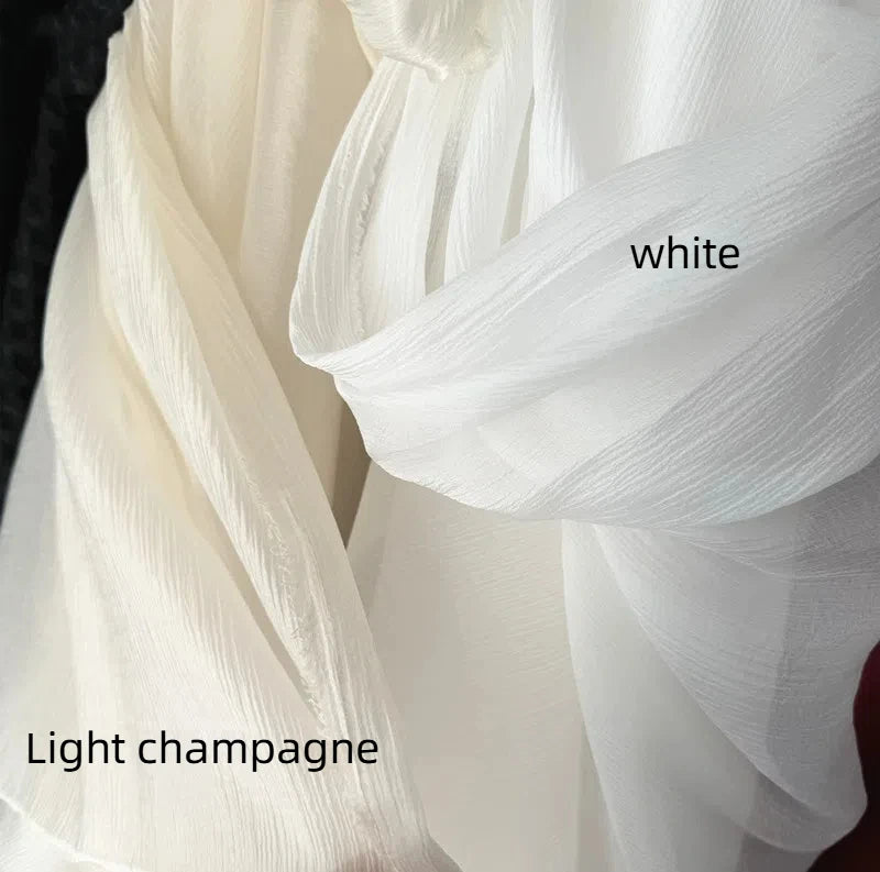 Hilo arrugado blanco champán albaricoque claro, tela fina semitransparente para hacer faldas de vestidos de novia.