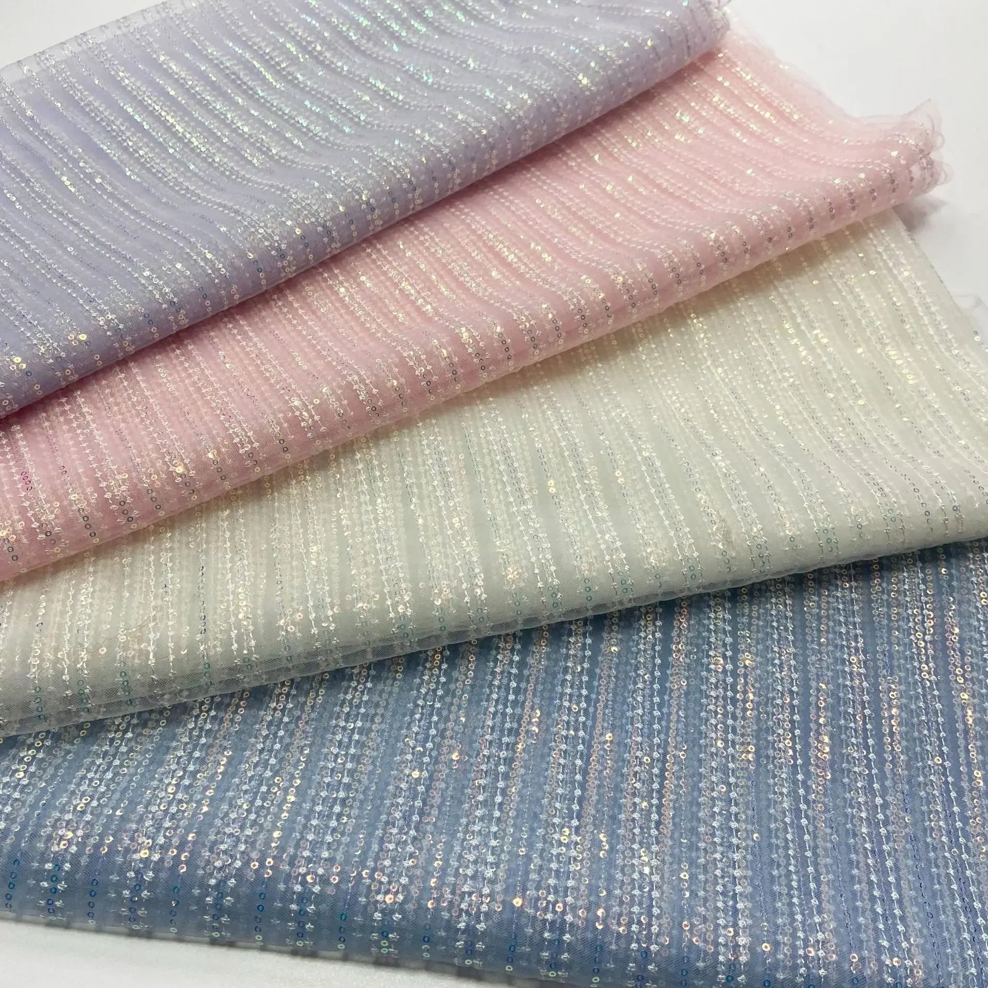 Tela de malla con lentejuelas de rayas verticales suaves, ligeras y brillantes de color sólido para vestido de noche, falda de escenario, ropa infantil