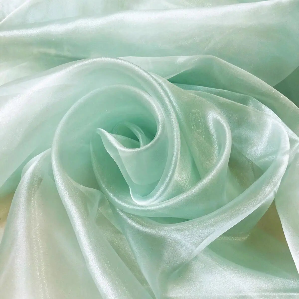 Transparent metallic organza fabric suitable for weddings formal gowns party decorations and bow decorations
