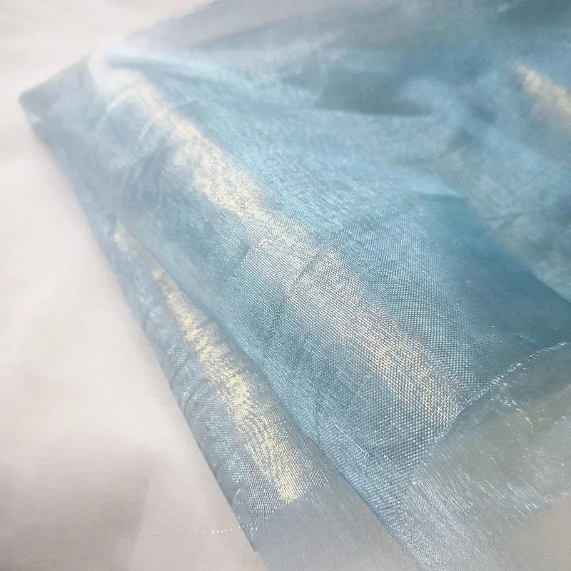 Mermaid Like Transparent Blue And Gold Full Plate Hot Stamping Fine Thread Organza Fabric Is Used For Handmade Of Party Costumes