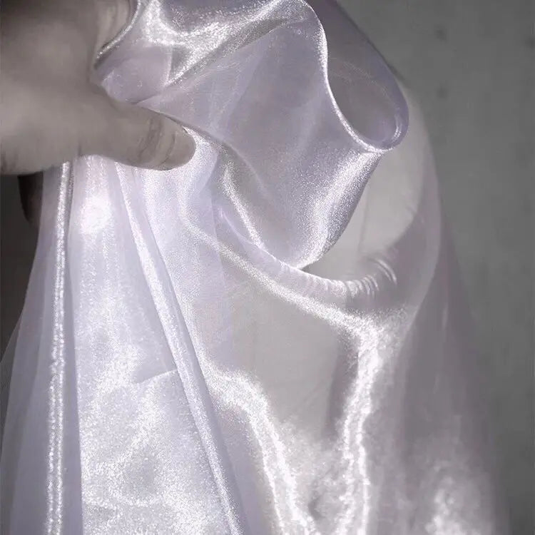 Transparent metallic organza fabric suitable for weddings formal gowns party decorations and bow decorations