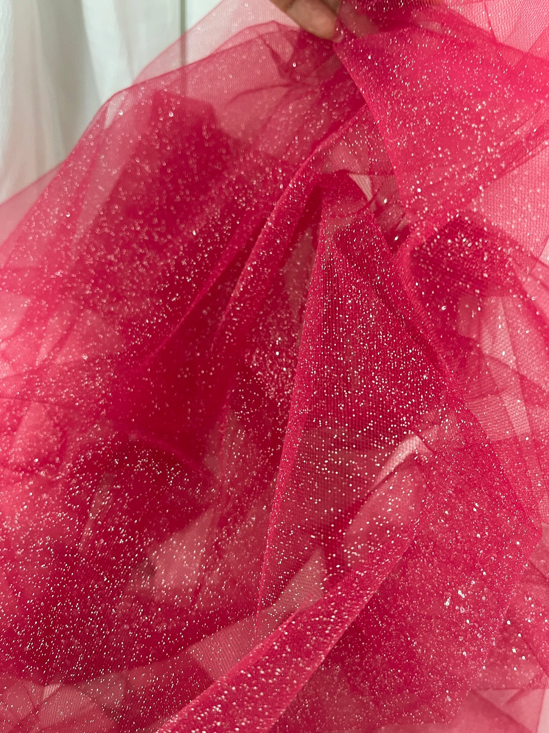 White fine sparkling silver powder with a hard and shiny transparent mesh background for wedding dress fabric decoration