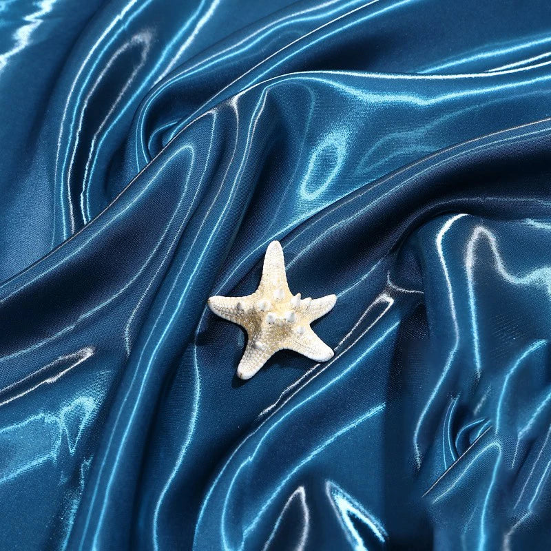 قماش ساتان سائل لامع - شارموز عاكس للملابس المسائية