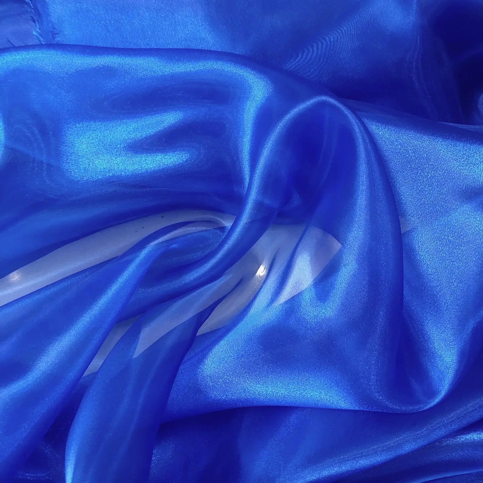 Transparent metallic organza fabric suitable for weddings formal gowns party decorations and bow decorations