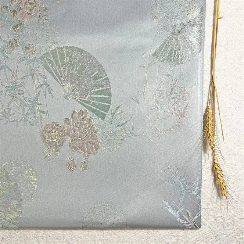 Tejido jacquard de hilo dorado - Patrón tradicional de hojas de bambú en forma de abanico