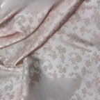 La tela jacquard de seda helada mate de la flor de estrella fugaz se puede utilizar para vestidos de novia, vestidos formales, telas DIY hechas a mano.