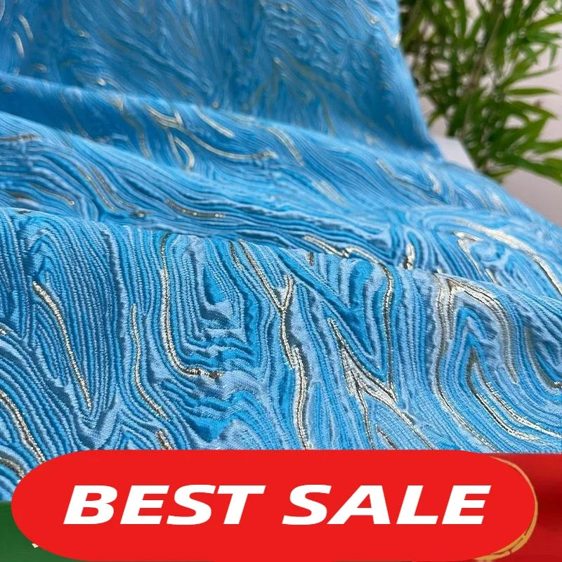 قماش التنورة والفساتين ذو الملمس المطلي بالذهب، سميك ومتدفق، انعكاس خفيف للضوء، نمط جاكار ثلاثي الأبعاد