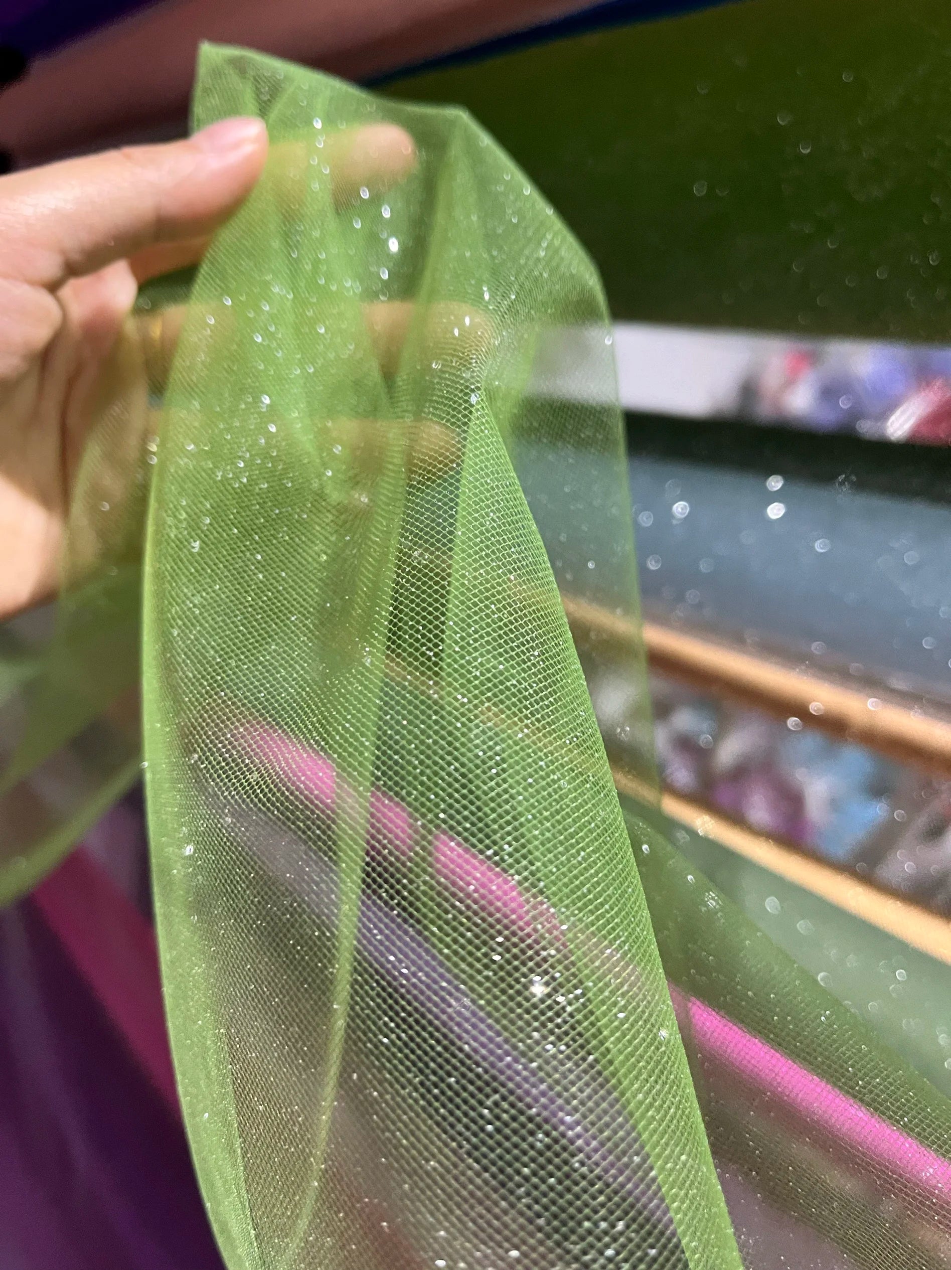 White fine sparkling silver powder with a hard and shiny transparent mesh background for wedding dress fabric decoration