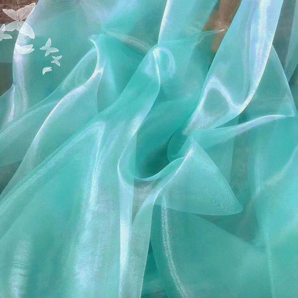 Transparent metallic organza fabric suitable for weddings formal gowns party decorations and bow decorations